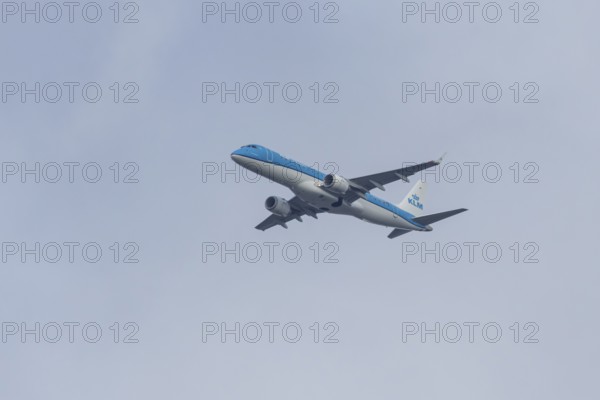 Embraer ERJ-190 jet passenger aircraft of Royal Dutch KLM cityhopper airlines in flight on approach
