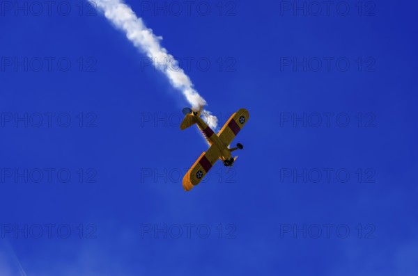 A Boeing PT-17 Stearman biplane, also Boeing Stearman Model 75, with the inscription 399 USNAVY