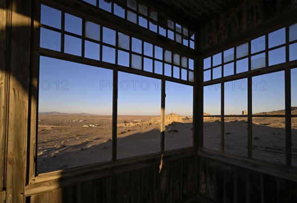 View from a former dwelling house into the desert, Kolmanskop, restricted diamond area, Karas