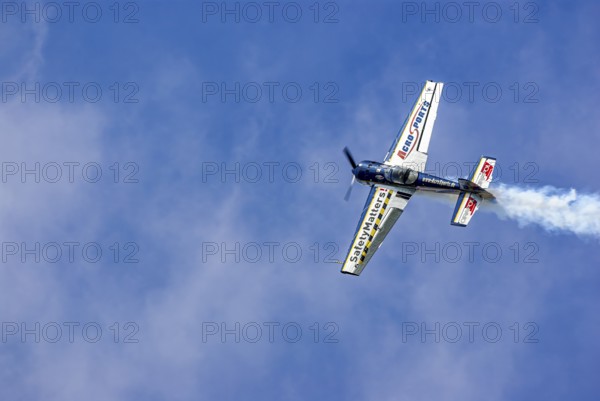 A Jakovlev Jak-55 with the registration LY-AGL during a flight demonstration as part of an air show
