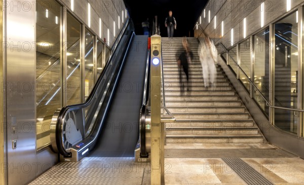Night photo, long exposure with motion blur, modern underground entrance at Unter den Linden