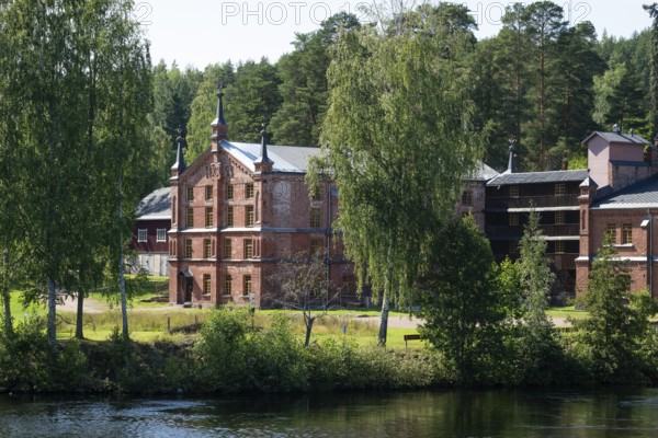 Brick factory building, former paper factory and mill for the production of groundwood pulp board,