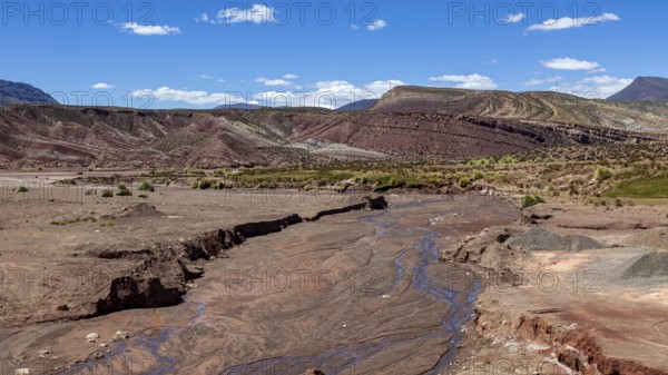 Erosion landscape with dry riverbed in a desert region, The landscape of the Altiplano in Bolivia