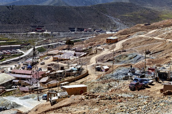 Extensive mining area with buildings and roads in a dry, barren landscape, The silver mines of