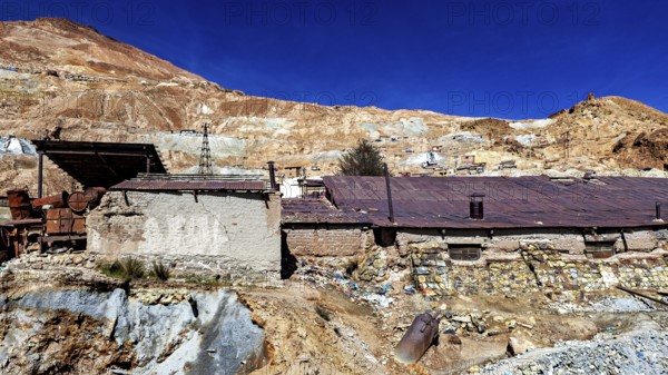 Old mine complex in desert-like surroundings with clear skies, The silver mines of Potosi Bolivia