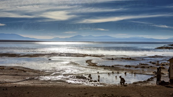 Landscape with hot springs, people and sweeping views of the lake and mountains, The thermal