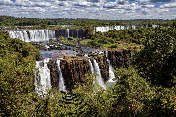 Panoramic views of a waterfall landscape, lush forests and dramatic differences in altitude, The