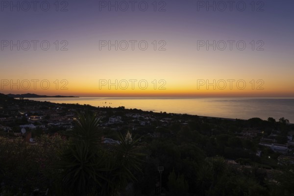 The sun rises on the Costa Rei, a stretch of coastline on the Italian Mediterranean island of