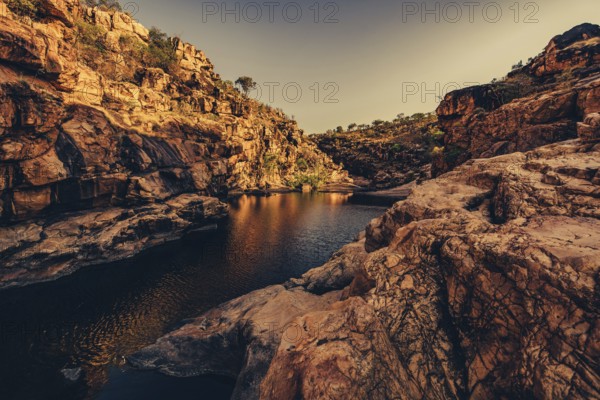 Bell Gorge waterfall, a body of water in north-west Australia in the Kimberley. Sunrise in the