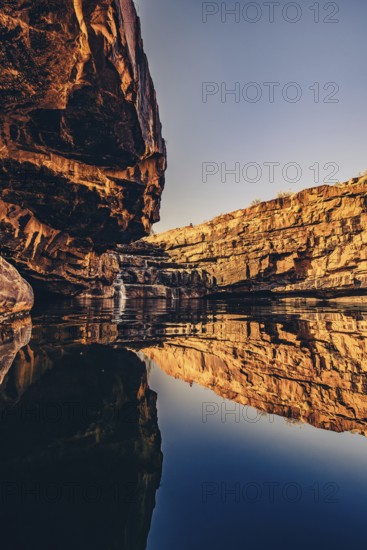 Bell Gorge waterfall, a body of water in north-west Australia in the Kimberley. Sunrise in the