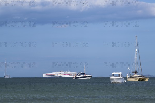 Boats on sea over Knoll Beach Studland, Poole, Dorset, England, United Kingdom