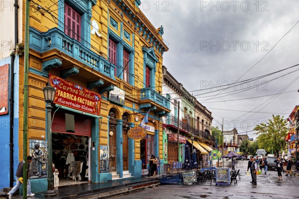 Traditional colourful facade of a shop on an empty city street, The colourful city and tango