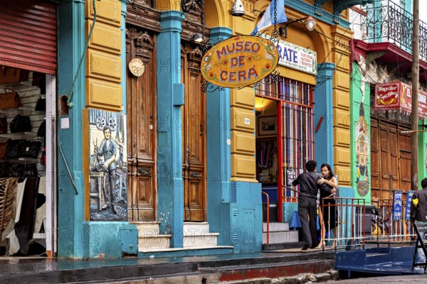 Entrance to a traditional museum with colourful building design and decorative lettering, The