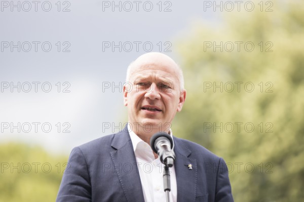 Kai Wegner (Governing Mayor of Berlin) gives a speech in front of the raising of the rainbow flag