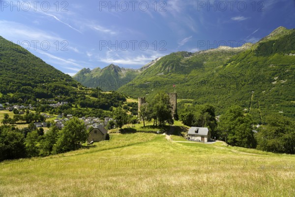 The ruins of the Château Sainte-Marie castle in Esterre and the mountain landscape near