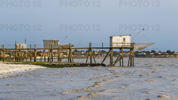 Fishing huts over Randonnee entre Histoire et Nature from a drone, Fouras, Fouras-les-Bains,