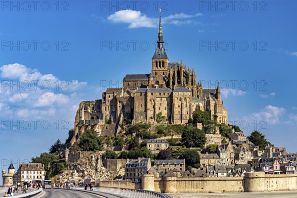 The historic monastery of Mont Saint-Michel against a bright blue sky, Mont Saint Michel in