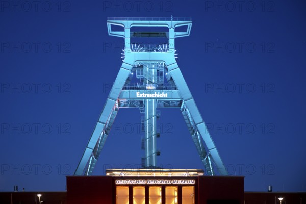 Illuminated headframe of the German Mining Museum at Extraschicht, Bochum, Ruhr area, North