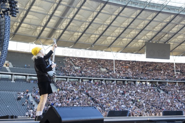 Angus Young, lead guitarist of AC/DC live on Power Up Tour 2025 at the Olympiastadion Berlin on 30