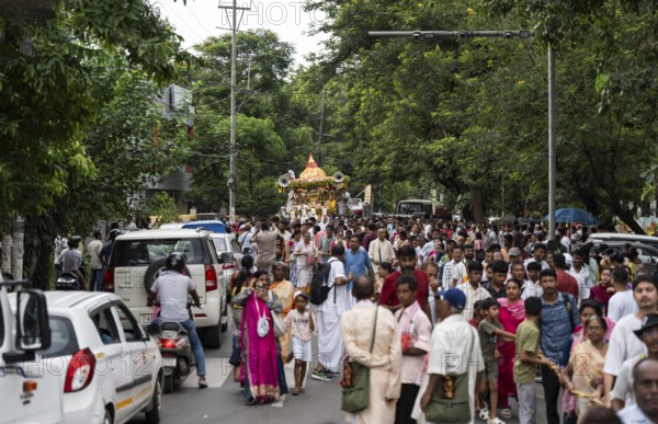 Hindu devotees takes part in Rath Yatra religious procession Guwahati, India on June 27, 2025. Rath