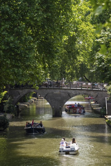 The old town centre of Utrecht, Oudegracht, around 2 km long with many old houses, shops,