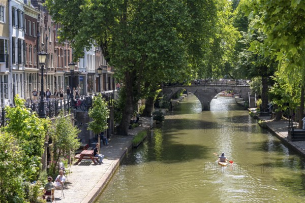 The old town centre of Utrecht, Oudegracht, around 2 km long with many old houses, shops,