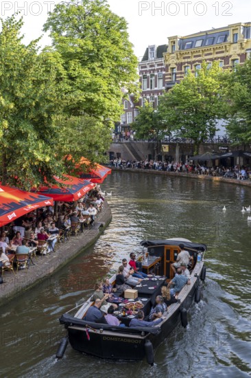 The old town centre of Utrecht, Oudegracht, around 2 km long with many old houses, shops,