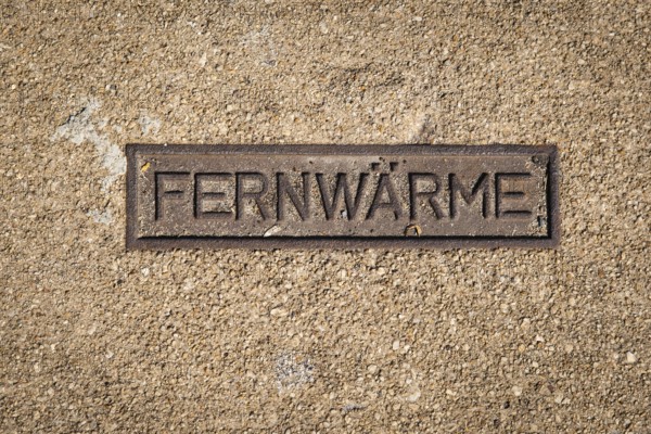 Sign for district heating on a manhole cover in Wuppertal, Germany