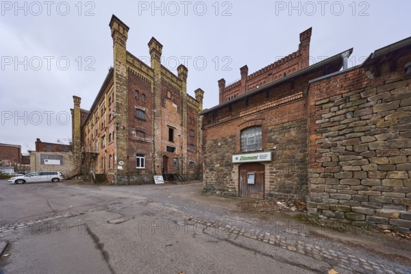 Old Diamant Brewery, brick building, historic brewery, ruin of a factory, diffuse light, cloudy,