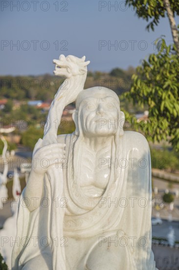 Statues around the perimeter of the Guan Yin (Goddess of Mercy) statue at Wat Huay Pla Kang Temple