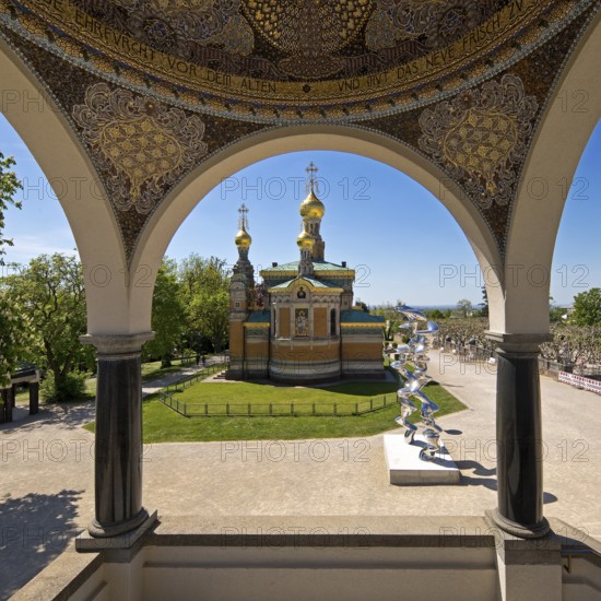 View from the pavilion to the Russian Chapel with the stainless steel sculpture by Tony Cragg,