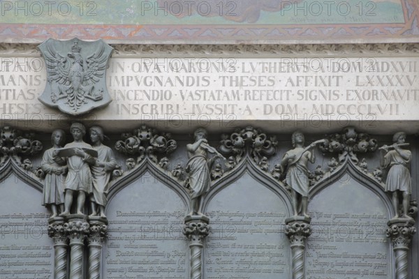 Detail of the theses door with inscription Martin Luther, church door, UNESCO, castle church,