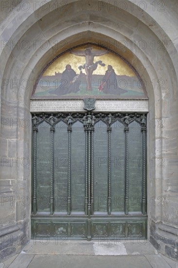 Thesis door and tympanum of the castle church with 95 theses published by Martin Luther on 30
