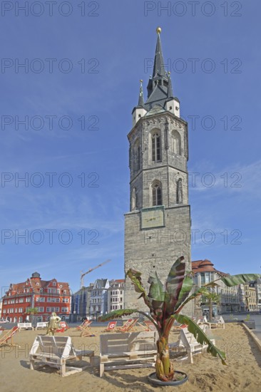 Red Tower with sandy beach, beach and palm tree, landmark, pedestrian zone, market square,