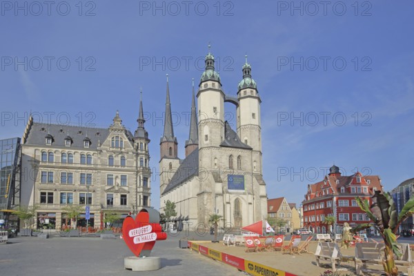 Market square with late gothic market church with twin towers, landmark, sandy beach, beach,