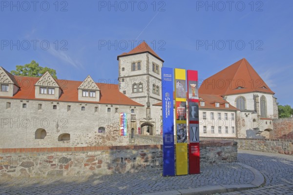 Moritzburg castle built in 1484 and entrance with banner to the art museum, Halle an der Saale,