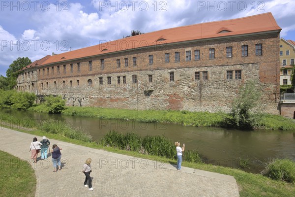 New Residence built in 1531 with bank of the millrace, pedestrian, photograph, Renaissance, Halle