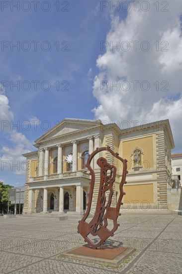 Opera House with sculpture Reliquie Mensch by Michael Morgner 2011, rusty steel sculpture, Modern