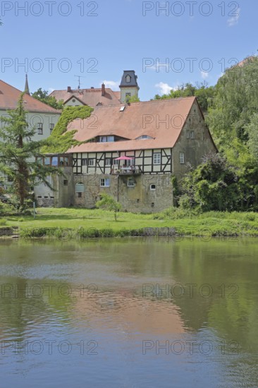 Saale river and historic half-timbered house Neumarktmühle, Saale valley, Merseburg, Saxony-Anhalt,