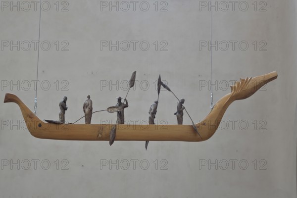 Sculpture Boat by Roland Lindner 2015, modern art, five standing paddling figures in a rowing boat,