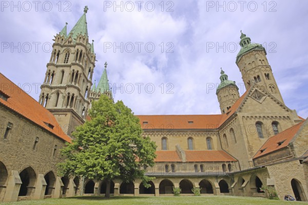 Late Romanesque UNESCO Cathedral of St Peter and St Paul with twin towers, inner courtyard with