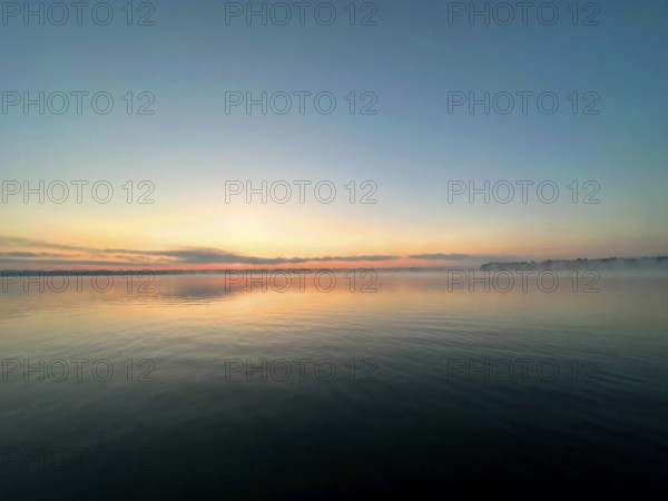 Evening mood, light fog over Lake Starnberg, Bavaria, Germany