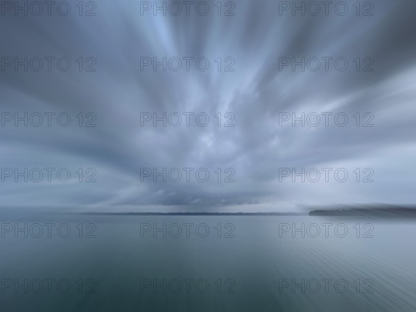 Dark clouds over Lake Starnberg, zoom effect, Bavaria, Germany