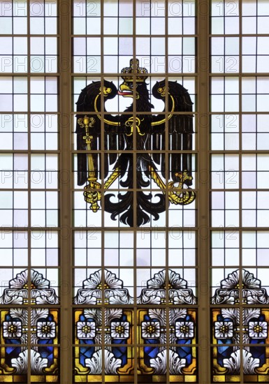 A stained glass window in the railway station with an imperial eagle is a reminder of the imperial
