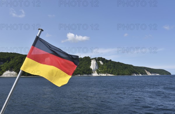 German flag on the Königsstuhl chalk cliff on Rügen, Mecklenburg-Western Pomerania, Germany