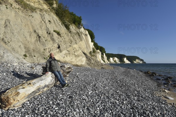 Hiker taking a break on the chalk coast of Rügen, Mecklenburg-Western Pomerania, Germany