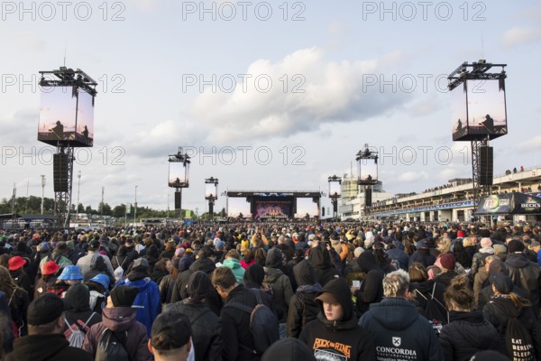 Festival visitors in front of the Utopia Stage at the Rock am Ring Festival on Sunday, Nürburgring