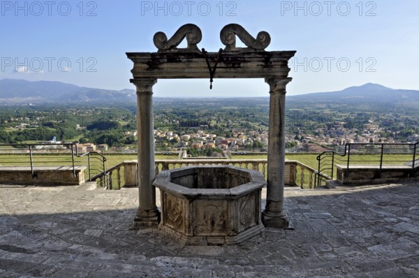 Fountain, draw well in the auditorium, theatre of Roman antiquity at the baroque palace Palazzo
