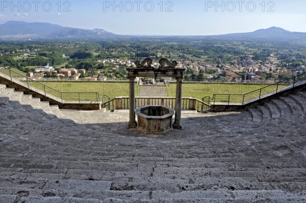 Fountain, draw well and flight of steps, rows of seats, auditorium, theatre of Roman antiquity at