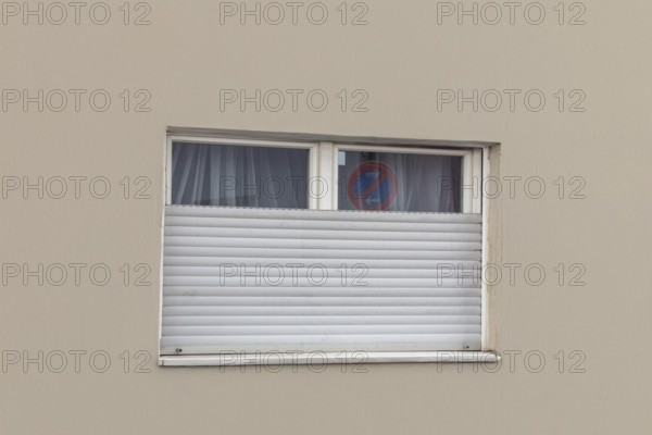 Broken roller shutter on a detached house